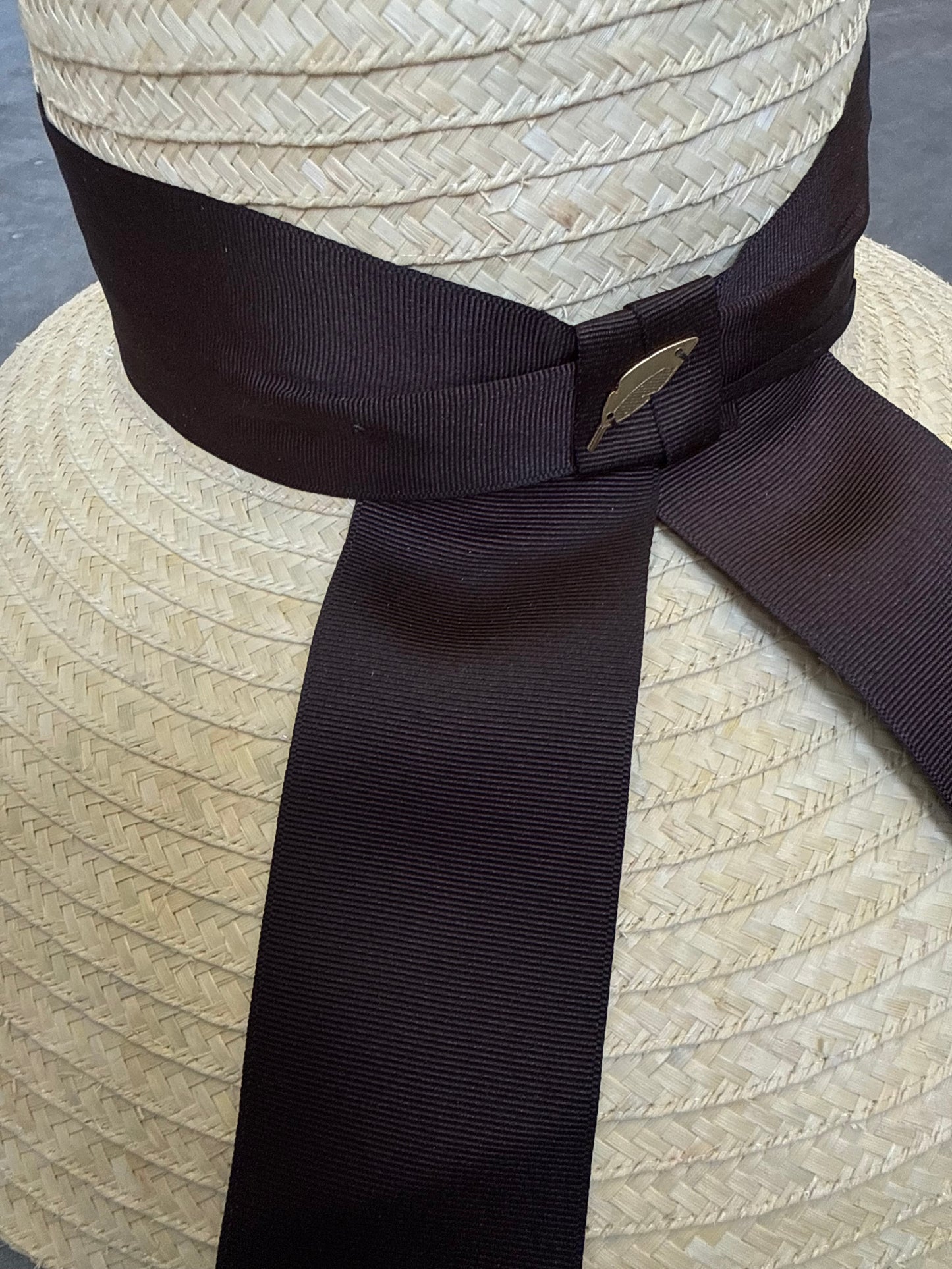 R I V I E R A brown hat